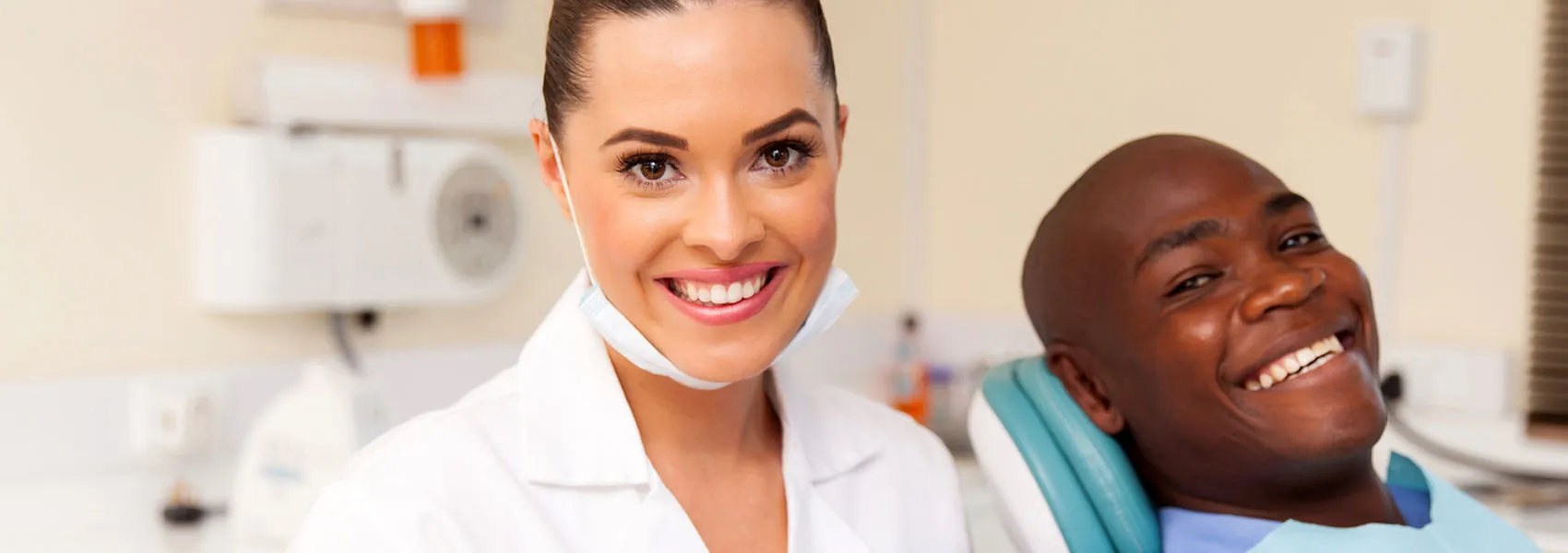 Happy dentist and patient