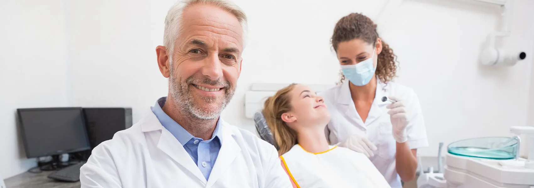 Dentist smiling at the dental