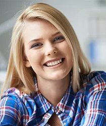 Happy beautiful girl smiling alone