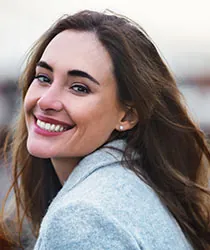 Happy lady smiling at outside