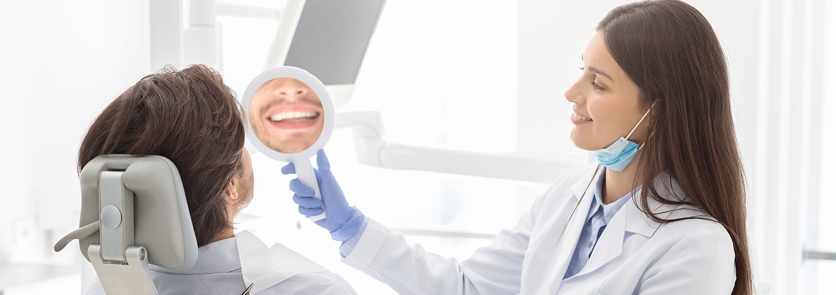 Patient looking at his teeth