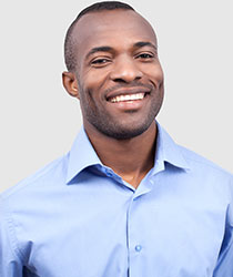 Young man smiling at office